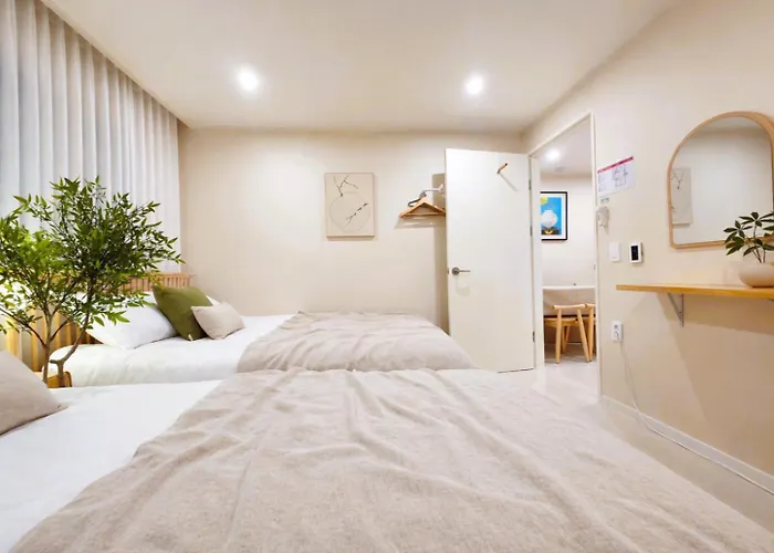 Апартаменты Jini Linen House Hongdae, 2br & 3 Queen Beds Сеул